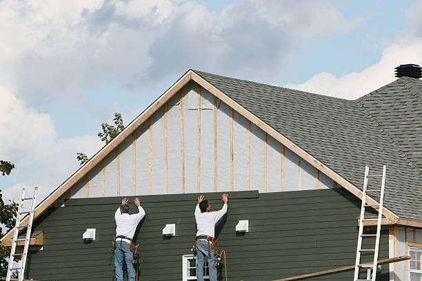 Professional Siding Installation technician working in Watertown, MA